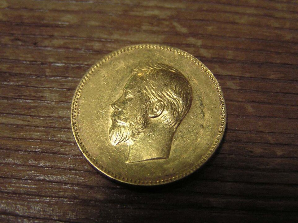 каржылык жыргалчылык үчүн алтын монета